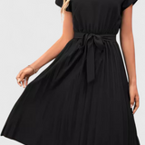 Elegantna Midi Haljina od Lagane Tkanine s Fluidnim Krojem